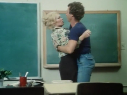 The teacher make a blowjob a student right in a classroom